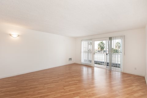 Living Room with Hardwood Floors and Patio Doors